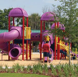 Colorful outdoor child playground. Playground dangers and injuries.